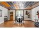 Dining area showcasing a wood ceiling, hardwood floors, and window with natural light at 129 Euharlee 5 Forks Rd, Euharlee, GA 30145