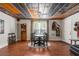 Dining area showcasing a wood ceiling, hardwood floors, and window with natural light at 129 Euharlee 5 Forks Rd, Euharlee, GA 30145