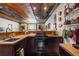 Cozy kitchen with dark cabinets, wood countertop, copper accents, and metal ceiling at 129 Euharlee 5 Forks Rd, Euharlee, GA 30145