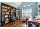 Inspiring office with a large bookcase, natural light, and comfortable seating at 129 Euharlee 5 Forks Rd, Euharlee, GA 30145