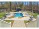 Inviting backyard pool with surrounding lounge chairs and a gazebo for outdoor relaxation at 129 Euharlee 5 Forks Rd, Euharlee, GA 30145