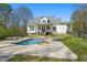 Inviting pool area with lounge chairs and a spacious patio, perfect for entertaining at 129 Euharlee 5 Forks Rd, Euharlee, GA 30145