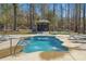 Beautiful swimming pool with fountains and lounge areas, perfect for outdoor entertaining at 129 Euharlee 5 Forks Rd, Euharlee, GA 30145
