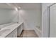 Bright bathroom featuring double sinks, large mirror, soaking tub, and a separate glass shower at 2054 Hickman Walk, Suwanee, GA 30024