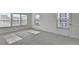 Spacious bedroom filled with natural light, providing a serene and airy atmosphere at 2054 Hickman Walk, Suwanee, GA 30024