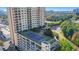 High-rise with a rooftop tennis court and garden area with parking below at 4561 Olde Perimeter Way # 702, Atlanta, GA 30346