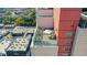 Aerial view of rooftop terrace with outdoor seating on top of a modern high-rise building at 4561 Olde Perimeter Way # 702, Atlanta, GA 30346