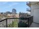 Balcony offers city views, a black metal railing and ample outdoor space at 4561 Olde Perimeter Way # 702, Atlanta, GA 30346