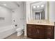 Clean, modern bathroom with tub and shower, contemporary fixtures, and stylish vanity at 4561 Olde Perimeter Way # 702, Atlanta, GA 30346