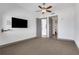 Bedroom with a TV and access to other rooms in the house at 4561 Olde Perimeter Way # 702, Atlanta, GA 30346