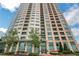Modern high-rise with balconies, large windows, landscaping, and a prominent sign at 4561 Olde Perimeter Way # 702, Atlanta, GA 30346