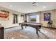 Well-lit game room featuring a billiard table and contemporary decor at 4561 Olde Perimeter Way # 702, Atlanta, GA 30346