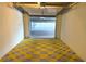 Spacious private garage parking features stylish tiled floors at 4561 Olde Perimeter Way # 702, Atlanta, GA 30346