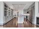 Spacious kitchen with stainless steel appliances, an island, and custom cabinetry at 4561 Olde Perimeter Way # 702, Atlanta, GA 30346