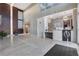 Elegant building lobby with marble floors, modern lighting, and a reception area at 4561 Olde Perimeter Way # 702, Atlanta, GA 30346