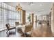 Comfortable lounge space with hardwood floors, bright light and comfortable furniture at 4561 Olde Perimeter Way # 702, Atlanta, GA 30346