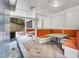 Charming outdoor seating area with cozy booths and a relaxing fountain at 4561 Olde Perimeter Way # 702, Atlanta, GA 30346