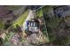 Aerial view of home showing property lines in a wooded neighborhood at 55 Legend Creek Cove, Douglasville, GA 30134