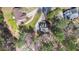 Aerial view of house in wooded neighborhood showing property lines at 55 Legend Creek Cove, Douglasville, GA 30134