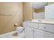 Traditional bathroom with neutral colors and white cabinets with a bathtub and shower at 55 Legend Creek Cove, Douglasville, GA 30134
