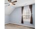 Well lit bedroom featuring natural light and dark wood accent drapes at 55 Legend Creek Cove, Douglasville, GA 30134