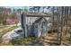 Two-story home featuring a large, manicured lawn and a private backyard at 55 Legend Creek Cove, Douglasville, GA 30134