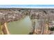 Scenic aerial view of the lake in the community at 55 Legend Creek Cove, Douglasville, GA 30134