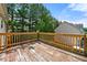 Spacious wooden deck, perfect for outdoor entertaining and relaxation at 125 Fairhaven Trl, Fairburn, GA 30213