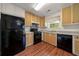 Functional kitchen with ample cabinet space and modern appliances at 125 Fairhaven Trl, Fairburn, GA 30213