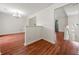 Open living space featuring hardwood floors that flow into the entryway at 125 Fairhaven Trl, Fairburn, GA 30213