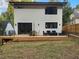 The backyard deck offers a peaceful retreat with views of the landscaped yard and is perfect for outdoor gatherings at 245 Mathewson Pl, Atlanta, GA 30314