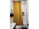 Well-lit bathroom with a tiled shower/tub combo, stylish curtain, and decorative accents creates a spa-like experience at 245 Mathewson Pl, Atlanta, GA 30314