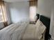 Comfortable bedroom featuring two twin beds and natural light at 245 Mathewson Pl, Atlanta, GA 30314
