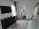 Bedroom with bunk bed and views of a bathroom, TV and closet at 245 Mathewson Pl, Atlanta, GA 30314