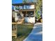 Inviting two-story home with modern design, a cozy front porch, and a well-manicured lawn at 245 Mathewson Pl, Atlanta, GA 30314