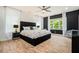 Spacious main bedroom with hardwood floors, ceiling fan, and natural light at 245 Mathewson Pl, Atlanta, GA 30314