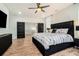 Spacious main bedroom with hardwood floors, ceiling fan, and modern design at 245 Mathewson Pl, Atlanta, GA 30314