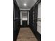 Spacious walk-in closet with custom shelving and ample storage space at 245 Mathewson Pl, Atlanta, GA 30314