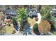 An aerial shot of a beautifully landscaped home with a circular driveway and lush greenery at 2867 Watchtower Approach Nw, Marietta, GA 30064