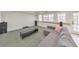 Basement living area with sofa, speakers, and view out to a set of windows at 2867 Watchtower Approach Nw, Marietta, GA 30064