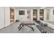 Basement workout area with weights, bench, and shelving at 2867 Watchtower Approach Nw, Marietta, GA 30064