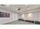 Basement media space with projector, speaker system, and comfortable seating at 2867 Watchtower Approach Nw, Marietta, GA 30064