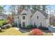 Charming home featuring lush landscaping and a well-maintained lawn at 2867 Watchtower Approach Nw, Marietta, GA 30064
