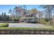 Charming exterior with a wrap-around porch and well-manicured landscaping at 2867 Watchtower Approach Nw, Marietta, GA 30064