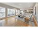 Bright open living room featuring hardwood floors, large windows, and modern finishes at 2867 Watchtower Approach Nw, Marietta, GA 30064