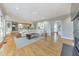 Open concept living room with hardwood floors, large windows and a view to the kitchen at 2867 Watchtower Approach Nw, Marietta, GA 30064