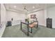 Brightly lit office featuring a ceiling fan, a built in desk, and a large speaker at 2867 Watchtower Approach Nw, Marietta, GA 30064