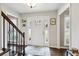 Inviting foyer with hardwood floors, staircase, and decorative accents, providing a warm welcome at 3034 Bristlewood Nw Ln, Marietta, GA 30064