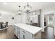 Spacious kitchen featuring a large island with white countertop and stainless steel appliances at 3034 Bristlewood Nw Ln, Marietta, GA 30064
