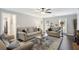 Bright living room featuring hardwood floors, lots of seating, and neutral décor at 3034 Bristlewood Nw Ln, Marietta, GA 30064